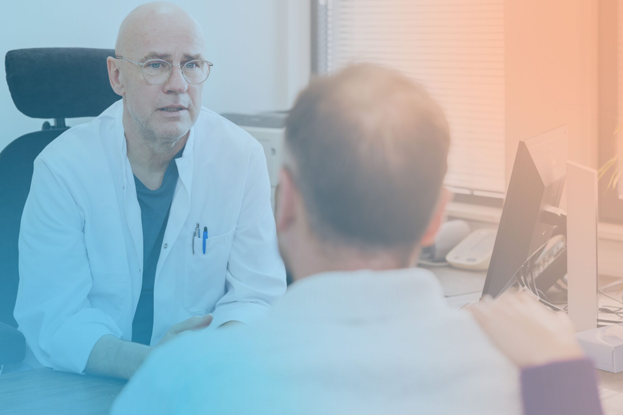 Male HCP Younger Patient Comforting By Caregiver 2000×1334